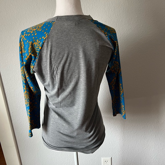 Lularoe Randy Raglan Gray with Blue & Mustard Yellow Patterned Sleeves - Picture 3 of 4